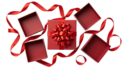 A beautifully wrapped red gift box with a large bow is centered among three open red box lids and a swirling red ribbon, all arranged on a dramatic black background