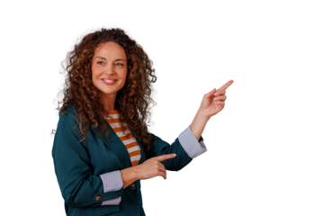 Business woman with curly hair smiling and pointing fingers up and to the side, presenting blank space, transparent background