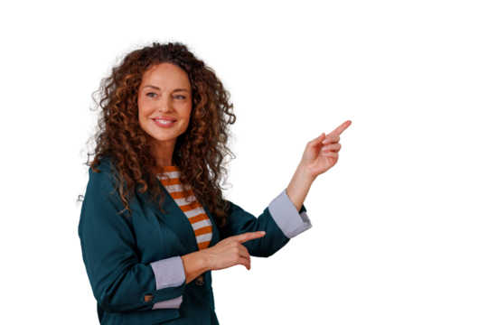 Business woman with curly hair smiling and pointing fingers up and to the side, presenting blank space, transparent background - Powered by Adobe