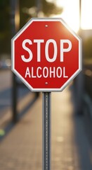 Bright red sign, stopping beverage intake. Metal post outdoors, golden light softly glows. Symbolizes January, sobriety, personal health choice, wellness initiative.