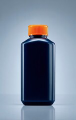 Dark blue bottle with orange cap, studio shot