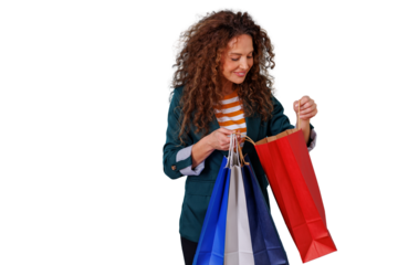Woman with curly hair feeling happy checking her shopping bags, enjoying consumerism and retail therapy, transparent background