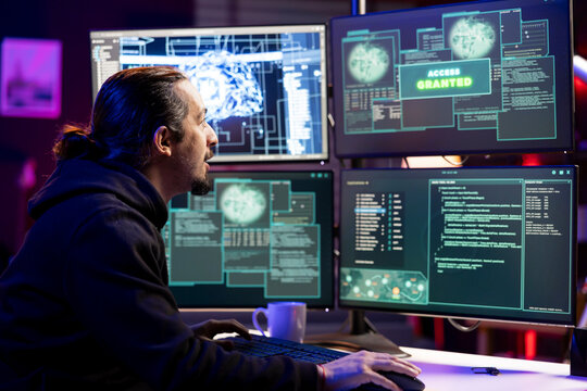 Hacker doing phishing attacks using AI deep learning, tricking users into revealing credit card data. Man launching DDoS attacks using neural network, flooding servers to crash websites