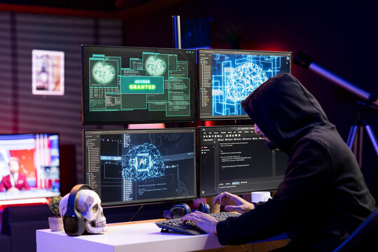 Rogue technician getting access granted message after using AI malware undetectable by antivirus. Hooded hacker breaching firewall security using artificial intelligence data mining script