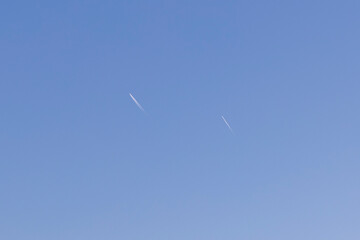 airplane's and their vapor trails in the sky