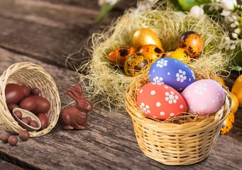 Collection of the beautiful colored easter eggs in the basket