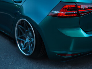 sports tuning car with stylish wheels and a low-slung car