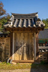 Traditional Wooden Gate with Korean Tiled Roof Structure