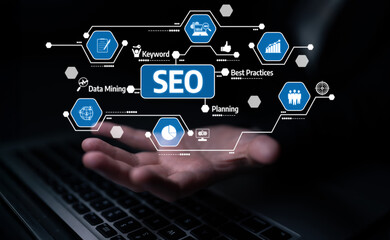 A hand reaches out towards a display of digital icons related to SEO strategies, data mining, and effective planning, symbolizing modern marketing approaches. Tessel