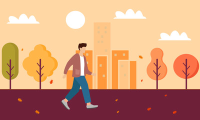 man walking in autumn park