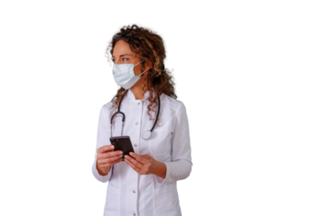 Female doctor wearing mask and lab coat, holding smartphone, looking away, providing healthcare and telemedicine support