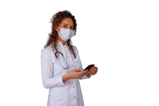 Doctor in white lab coat wearing face mask, using smartphone for telemedicine on transparent background
