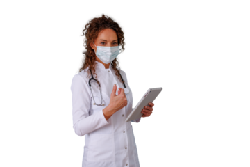 Female doctor wearing medical mask and stethoscope holding digital tablet giving thumbs up on transparent background