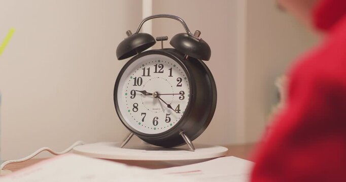 The children are doing their homework very late.