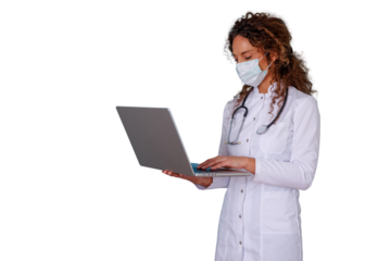 Female doctor in lab coat and face mask using laptop, providing online consultation and telemedicine service