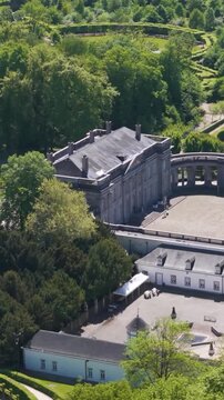 magnificent buildings parks ponds ch&acirc;teau seneffe visitors walking grounds add life scene reflecting site's popularity to left right pans aerial of de 