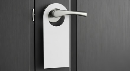 Blank white door hanger sign on a modern hotel room door handle