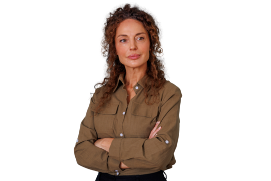 Mature woman with curly hair looking away, crossing arms, confident and thoughtful with a transparent background