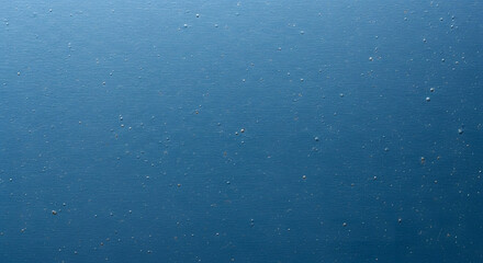 Blue water texture: An abstract high-angle shot offers a captivating look at tranquil blue water, presenting the mesmerizing textures and patterns formed by light and movement.