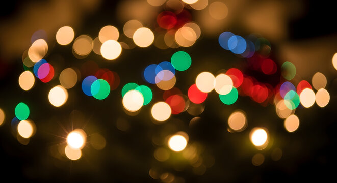 Close-up of twinkling holiday lights with blurred bokeh effect — abstract festive background.