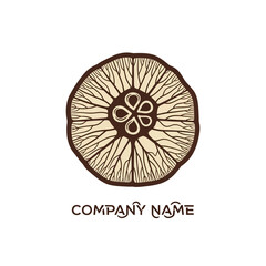 Circular wooden logo design with intricate details and company name.