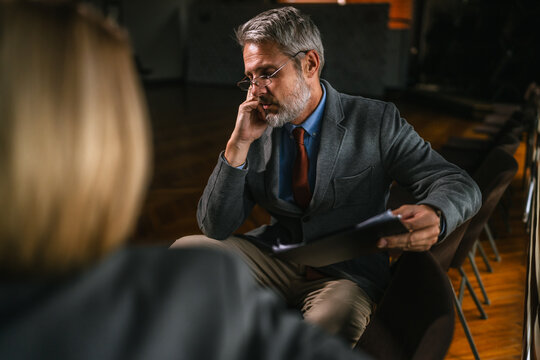 Psychologist counseling patient during a mental health therapy session