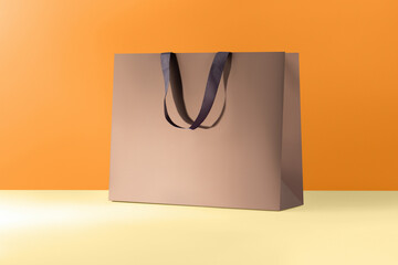 Brown paper glossy shopping bag mockup