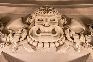 Wall decoration in eclectic Beaux-Arts style of Second Empire in France, elements of neo-baroque, classicism and Roman architecture, golden stucco, rich decoration