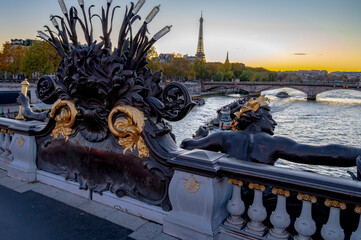 Sunset view on bridges, embarkment of Seine river, streets, buildings, parks and museums in capital of France, central part of Paris, tourists destination, autumn in Paris