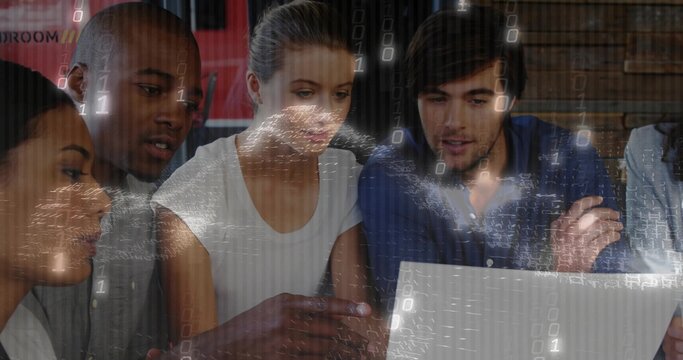 Leaning five adults working around laptop at bench, in casual shirts with binary overlay - Powered by Adobe