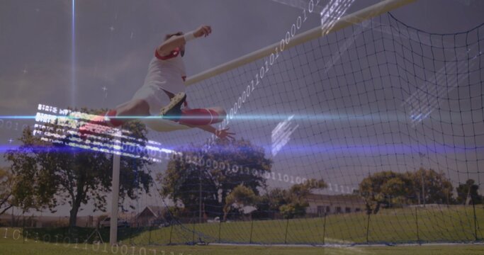 Jumping male athlete in white red kit clearing goal crossbar on grass pitch with binary overlay - Powered by Adobe
