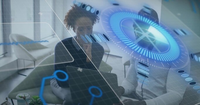 Examining two colleagues in formal wear consulting open laptop in office lounge, blue HUD