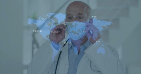Adjusting senior doctor pulling mask up in clinic, with lab coat, gloves, stethoscope, map overlay