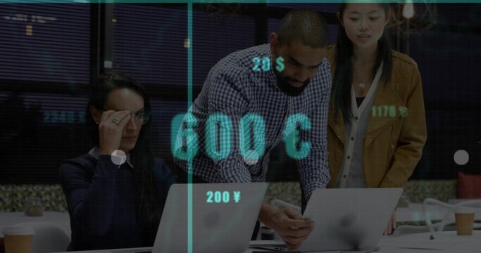 Analyzing finance overlay, three colleagues in business reviewing two open laptops at office