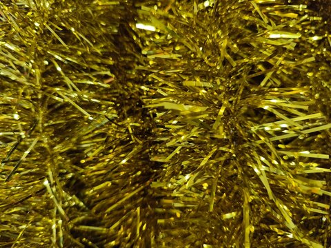 Malaysia November 2 2025 &mdash; Traditional Malay Bunga Manggar Decorative Ornament. Made from finely cut shiny plastic strips in gold and silver, it symbolizes joy, prosperity, and warm hospitality.