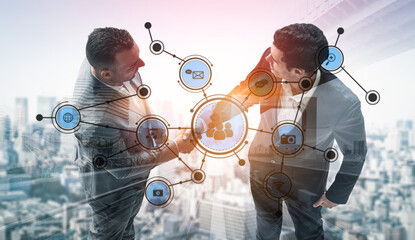 Two businessmen engage in a confident handshake, surrounded by digital network connections, symbolizing partnership and collaboration in an urban landscape. Tessel