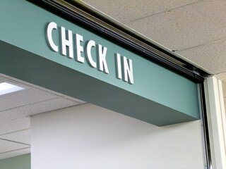Obraz premium Check In Sign at Office Entrance