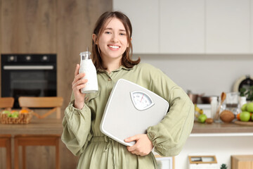 Young woman with chia seed yoghurt and weight scales in kitchen