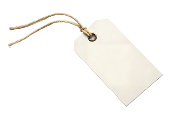A blank off-white paper price tag or gift label with a reinforced hole and rustic jute twine string, isolated on a white background with copy space