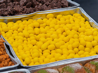 Assorted Traditional Sweets Displayed at a Marketplace