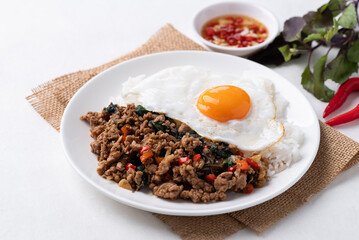 Thai food, Stir fried holy basil with minced pork with cooked rice and fried egg on top
