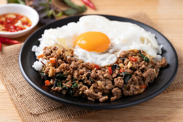Thai food, Stir fried holy basil with minced pork with cooked rice and fried egg on top