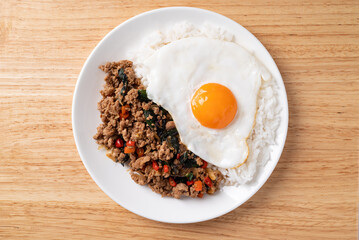 Thai food, Stir fried holy basil with minced pork with cooked rice and fried egg on top