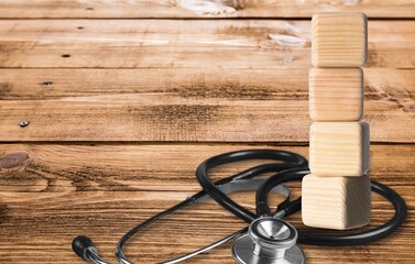 Geometry square  of wood blocks on desk
