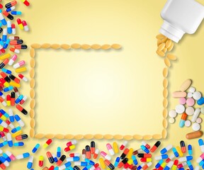 Pills spilling out forming a rectangle frame and bottle