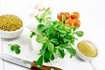 Fenugreek green in mortar on table