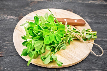 Fenugreek green on dark board