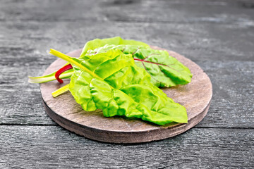 Mangold on dark board