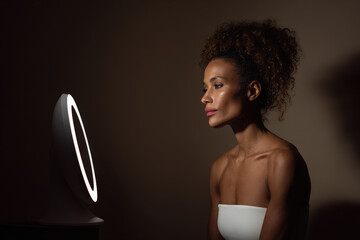 festive santa hat placed on clean white background radiating holiday cheer and joy