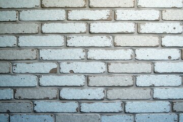 Obraz premium A Textured Wall of Distressed Light Blue and Gray Bricks Featuring a Subtle Gradient